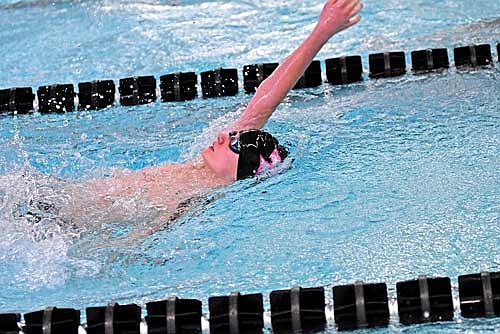 Hunter Guckenberg takes part in the 100 backstroke in a double dual against Antigo and Rhinelander Thursday, Jan. 16 at the Lakeland Union High School pool in Minocqua. Guckenberg finished third with a time of 1:17.34. (Photo by Brett LaBore/Lakeland Times)