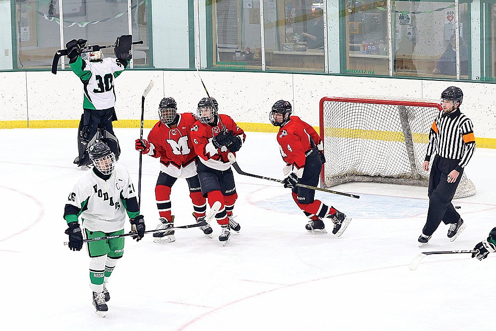 Medford players, from left to right, Cade Wellman, Mason Harris and Logan Koski react after a power play goal by Harris during the third period of a GNC boys’ hockey game against Rhinelander at the Rhinelander Ice Arena Thursday, Jan. 16. Rhinelander fell to 0-4 in conference play with a 5-1 loss to the Raiders. (Bob Mainhardt for the River News)