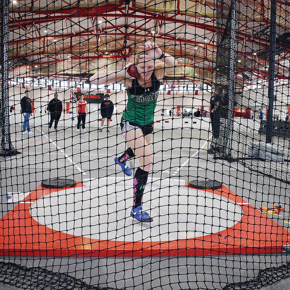 Rhinelander’s Jayme Wyss prepares to throw the shot during the USA National Masters Indoor Heptathlon in Kenosha Saturday, Jan. 11. Wyss set the women’s 35-39 America Record in the heptathlon, scoring 3,420 points. (Submitted photo)