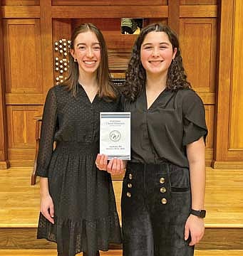 Samantha Bridgwater, right, and Sydney Pitzer, left, choral students at Lakeland Union High School, were selected to sing in the all-state treble choir during the Wisconsin Choral Directors Associations’ all-state choirs concert. (Contributed photograph)