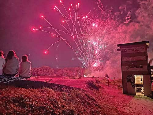 In this Aug. 17, 2024 file photo, fireworks are shot off at West Side Park in Rhinelander to commemorate the Hodag BMX Club’s 25th year of racing at the venue. The common council moved Monday to move its 2025 Fourth of July fireworks display to West Side Park after city administration explained that the planned road and utility construction project in the Hodag Park neighborhood will make travel to the park for the annual Independence Day event extremely problematic. (Photo by Jeremy Mayo/River News)