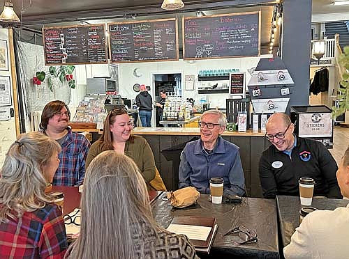 Gov. Tony Evers and Department of Children and Families Secretary Jeff Pertl visited The Morgue Coffee Company in Rhinelander Thursday morning, Jan. 23, for a community roundtable discussion on the challenges facing local families. The visit was part of a three-city tour in support of Evers’ annual State of the State Address which he delivered Wednesday evening. During the speech, Evers pronounced 2025 the Year of the Kid and detailed his plans to improve the lives of Wisconsin children as well as reduce costs for working families. Pictured: Matt Persike and Elissa Sheffer of the Rhinelander District Library, and Department of Children and Families Secretary Jeff Pertl, right, listen as Gov. Tony Evers talks about his annual State of the State Address. Facing the governor are, from left to right, are Courtney Smith, executive director of the Rhinelander Area Food Pantry, Nicolet College President Kate Ferrell and Di Wu, instructional designer at Nicolet College. (Photo by Heather Schaefer/River News)