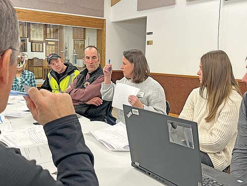 Civil engineer Angie Kerrigan of Mead & Hunt facilitates a meeting regarding a reconstruction project of the Dam Bridge on County Highway W at the town hall on Thursday, Jan. 30, in Manitowish Waters. (Photo by Trevor Greene/Lakeland Times)