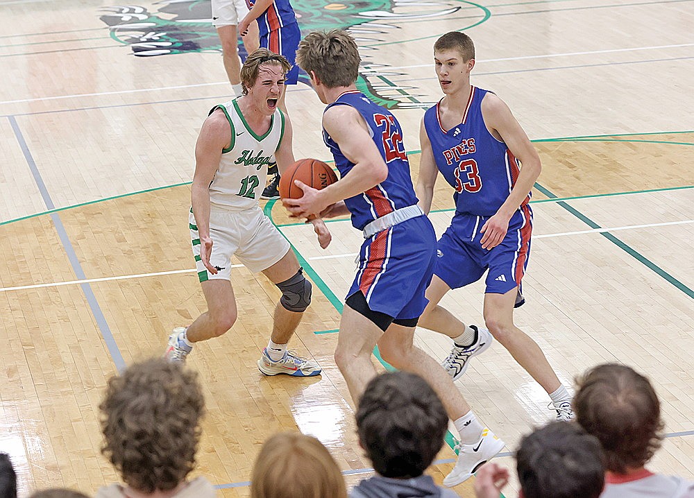 Rhinelander’s Truman Lamers pressures Northland Pines’ Milo Albrecht (22) during the first half of a GNC boys’ basketball game at the Jim Miazga Community Gymnasium Friday, Jan. 31. Rhinelander defeated Northland Pines, 56-38, and moved back into a first-place tie with Medford in the GNC. (Bob Mainhardt for the River News)