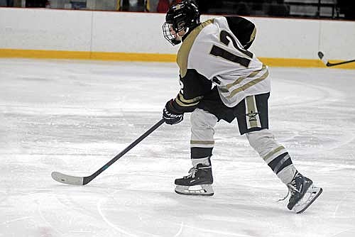 Caden Schillinger skates on the ice during the third period against Waupaca during a Great Northern Conference tournament quarterfinal game Tuesday, Feb. 4 at Lakeland Hawks Ice Arena in Minocqua. (Photo by Brett LaBore/Lakeland Times)