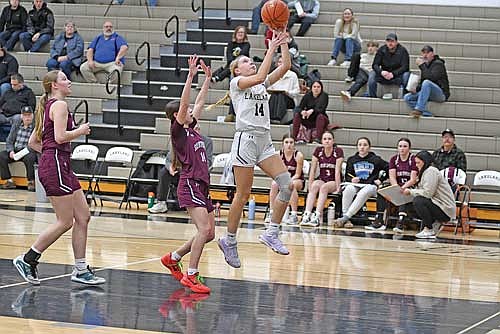 Ali Timmerman makes a layup in the first half of a 93-36 win over Solon Springs Tuesday, Feb. 4 at Ted Voigt Court in Minocqua. (Photo by Brett LaBore/Lakeland Times)