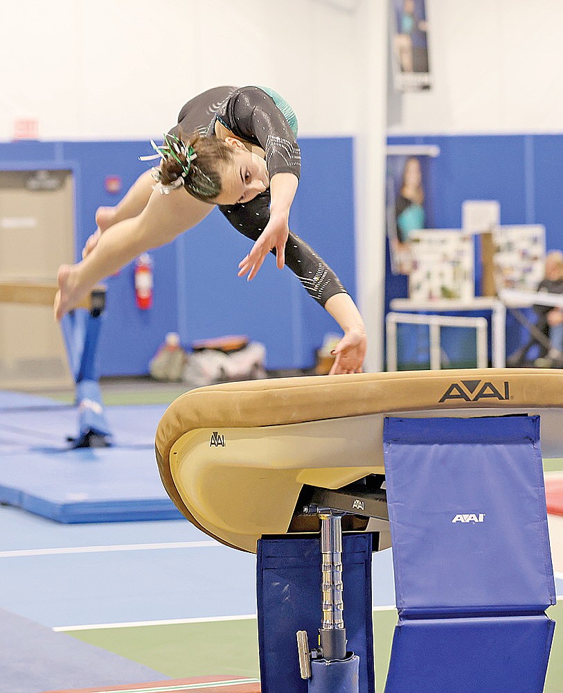 Rhinelander’s Alexis Smith performs a vault during a GNC Small division gymnastics meet against Antigo at the YMCA of the Northwoods Tuesday, Feb. 4. Smith won the event and finished third in the all-around. (Bob Mainhardt for the River News)