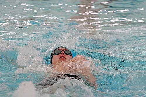 Braelen Hesch swims the backstroke portion of the 200 IM during the Great Northern Conference Meet Friday, Feb. 7 at the Heck Family Community Pool in Rhinelander. Hesch had Lakeland’s best finish, placing fourth in the 100 backstroke. (Photo by Jeremy Mayo/River News)