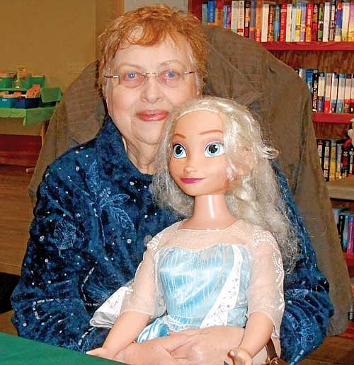 At the recent Enchanted Doll Club meeting, club members shared dolls representing winter. Nancy Mansavage of Eagle River brought a large Elsa doll from the movie “Frozen” to the meeting. (Contributed photograph)