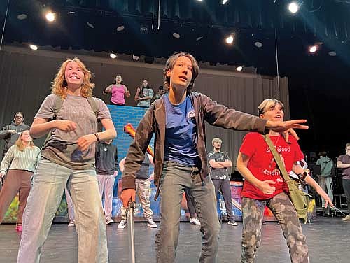 Emma Lehe as Grover Underwood, left, Bowen Slone as Percy Jackson and Piper Lundquist as Annabeth Chase rehearse for “Lightning Thief” Monday, Feb. 17, in Minocqua. (Photo by Kate Reichl/Lakeland Times)