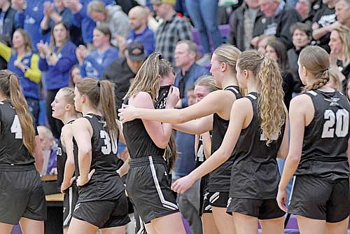 Saylor Timmerman, right, consoles Ava Evenhouse following a 59-47 loss to Rice Lake in a WIAA Division 2 sectional semifinal game Thursday, March 6 at Richard D. Sundberg Gymnasium in Ashland. (Photo by Brett LaBore/Lakeland Times)