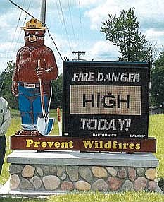 A new, electronic, digital Smokey Bear fire danger sign, similar to the sign in the photo, will be installed on the grounds of the Minocqua’s fire station next to U.S. Highway 51. (Contributed photograph)