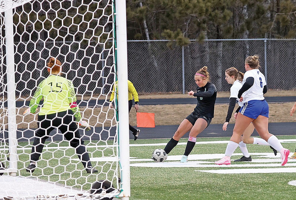 Rhinelander’s Sophie Miljevich fires a shot on goal during the second half of a non-conference girls’ soccer game against Three Lakes at Mike Webster Stadium Tuesday, April 8. Miljevich scored on the play, one of four goals for the senior in an 8-0 victory over the Bluejays. (Bob Mainhardt for the River News)