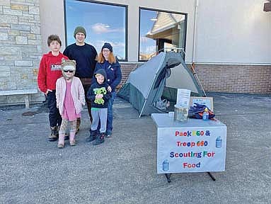 Collecting donations on behalf of the scouts outside Trig’s on April 5 are (from the left) Noah Kunzman, Evelyn Weyker, Nathaniel Kunzman, Eugene Miller and Hazel Kunzman. (Contributed photograph)