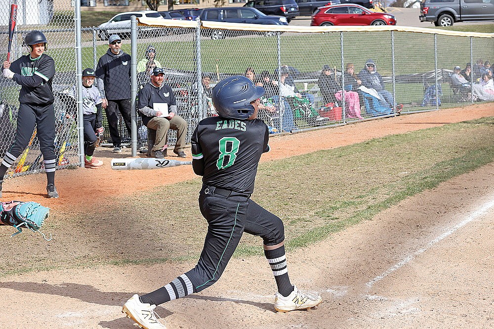 Jaxon Eades hits a home run during the 11U championship game against the Northwoods Storm.
