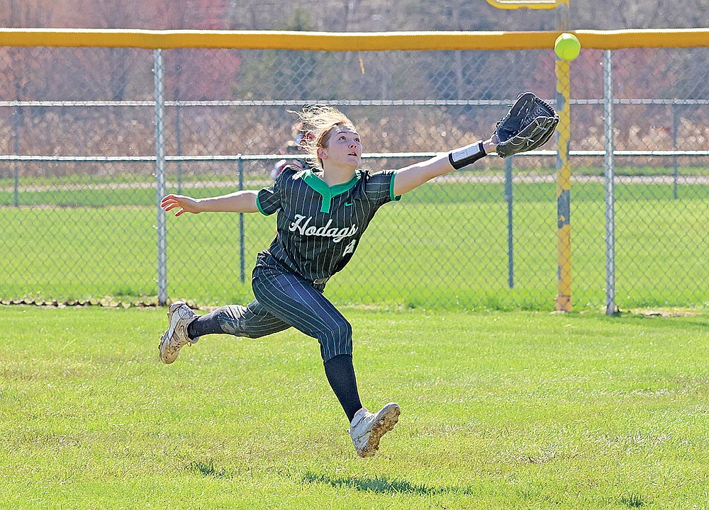 Rhinelander’s Kayln Miller attempts to catch a foul ball during the first inning of Game 1 of a GNC doubleheader at Medford Tuesday, April 29. (Matt Frey/Star News)