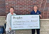 Pictured at the check presentation are Christy Seidel, Branch Manager, and Stephanie Dahlquist, Mortgage Lender at Peoples State Bank and Rhinelander Kiwanis Club Board Member. (Contributed photograph)