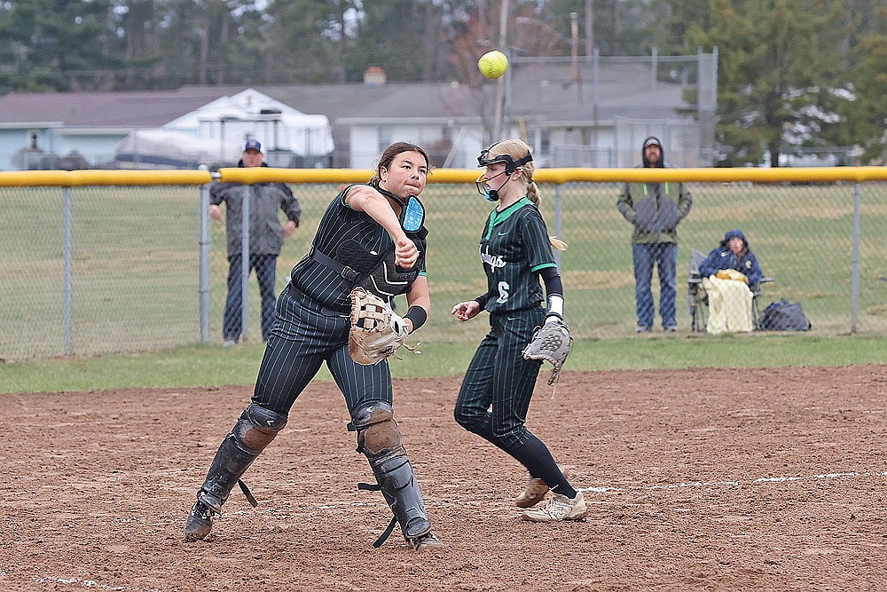 Rhinelander’s Saige Mutter makes a throw to first on a bunt during a GNC softball game at Tomahawk Thursday, May 1. (Bob Mainhardt for the River News)