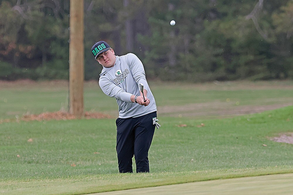 Rhinelander’s Sam Schoppe hits a chip shot onto the green on the par-4 first hole at Inshalla Country Club in Tomahawk during a GNC tournament round Friday, May 2. Schoppe shot 2-over 72 to win the second leg of the tournament. (Jeremy Mayo/River News)