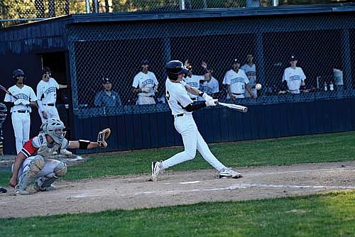 Benny Gahler swats a two-run walk-off home run in the seventh inning of a conference game against Medford Monday, May 5 at the Lakeland Union High School baseball field in Minocqua. It was Gahler’s first-career prep home run. (Photo by Brett LaBore/Lakeland Times)
