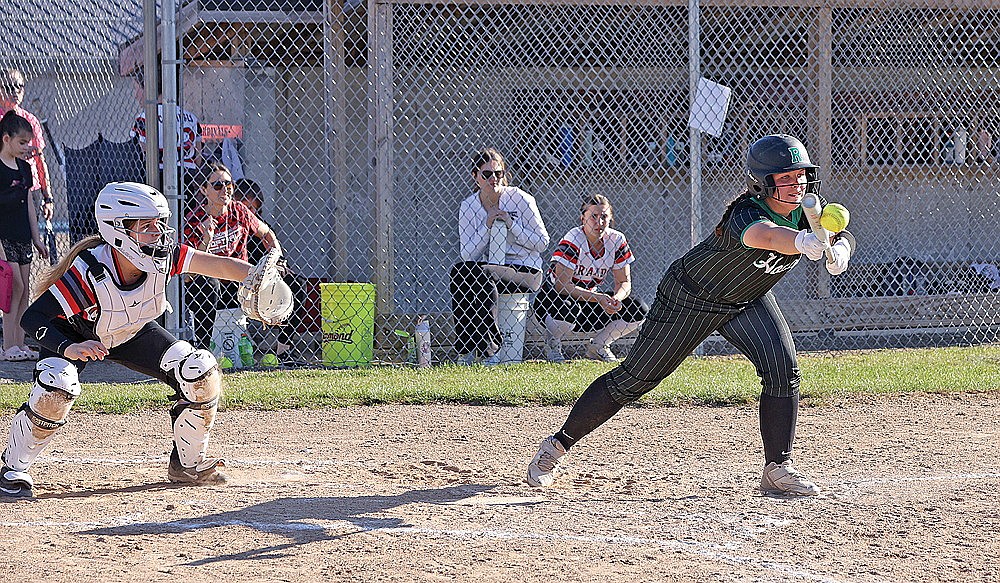 Rhinelander’s Kadyn Taylor lays down a bunt during the seventh inning of a non-conference softball game at Crandon Monday, May 5. The Hodags scored two runs in the seventh to defeat Crandon, 6-4. (Bob Mainhardt for the River News)