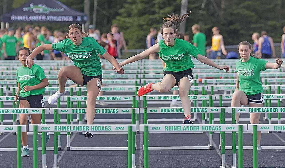 From left to right, Hailey Jackson, Isabelle Gray, MaKenzy Mess and Hailey Novak compete for the JWMS girls’ track team in the 100-meter hurdles Monday, May 5. (Jeremy Mayo/River News)