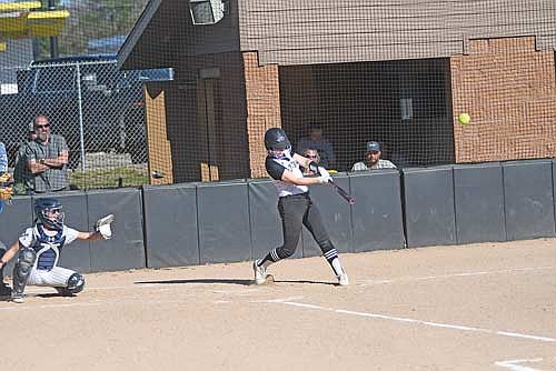 Addison Trapp doubles to center in the third inning of a conference game against Tomahawk Thursday, May 8 at Lenz Field in Minocqua. (Photo by Brett LaBore/Lakeland Times)