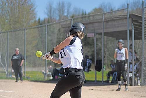 Addison Trapp homers to left in the sixth inning against Waupaca Saturday, May 10 at Martzke Park in Shawano. Trapp hit Lakeland’s first home run of the season. (Photo by Brett LaBore/Lakeland Times)