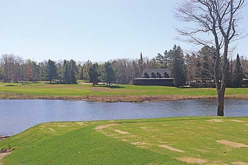 The 18th hole at Trout Lake Golf Course has been updated with a new fairway, green surrounds and tee boxes overlooking the Trout River. (Photo by Michael Strasburg/Lakeland Times)