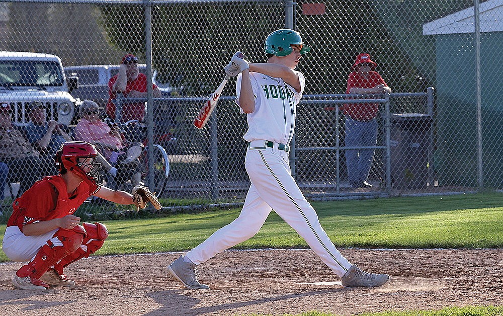 Rhinelander’s Vince White swings at a pitch during a non-conference baseball game against Wausau East at Stafford Field Monday, May 12. White went 2-for-3 and hit a game-tying triple in the seventh inning Tuesday at Antigo as the Hodags rallied from behind to beat the Red Robins, 11-8. (Bob Mainhardt for the River News)
