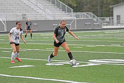 Justine Abel controls possession in the second half of a conference game against Mosinee Thursday, May 15 at IncredibleBank Field in Minocqua. (Photo by Brett LaBore/Lakeland Times)