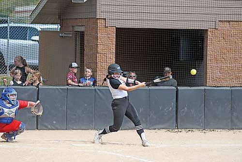 Marlee Strasburg hits a two-run double in the first inning of a conference game against Northland Pines Thursday, May 15 at Lenz Field in Minocqua. Strasburg finished with a career-high eight RBIs, including her second home run in as many games. (Photo by Brett LaBore/Lakeland Times)