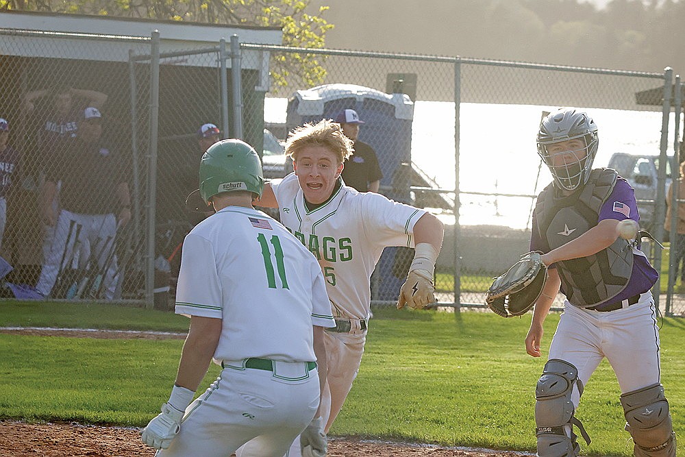 Rhinelander’s Jackson Waydick celebrates with teammate Rowan Wiczek (11) after scoring the winning run in the Hodags’ 4-3 victory over Mosinee in a GNC baseball game at Stafford Field Friday, May 16. The Hodags scored two runs as a result of a two-out throwing error by Mosinee shortstop Treve Stoffel to win the game. (Jeremy Mayo/River News)