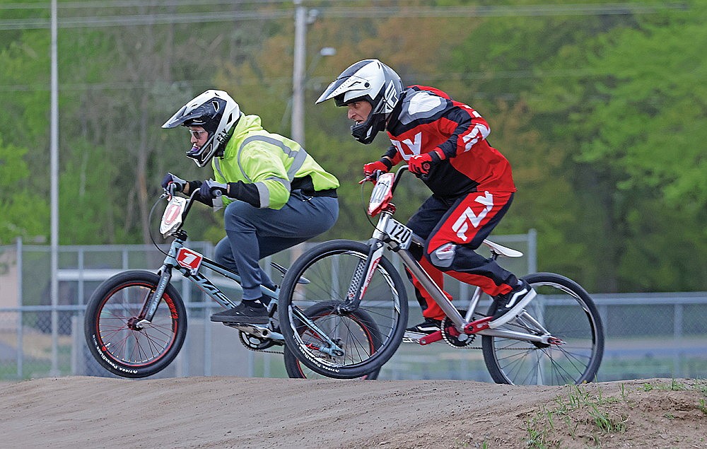 Branton Kegley (1) of Pelican Lake and Kristopher Hansen (720) of Appleton race side-by-side in the 26-35 Novice class.