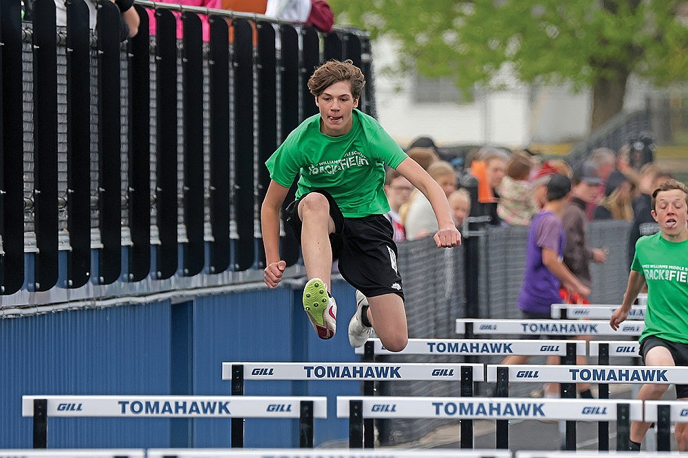 Dawson Sachse competes in the 110-meter hurdles during the Tomahawk GNC middle school track invite Monday, May 19.