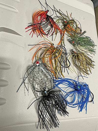 Swim jigs come in a variety of weights and colors. This allows the angler to “match the hatch,” or to match the forage that is in a specific lake on which a bass is normally feeding anyway. The different weights allow the angler to fish shallower or deeper more easily. (Photo by Beckie Gaskill/Lakeland Times)
