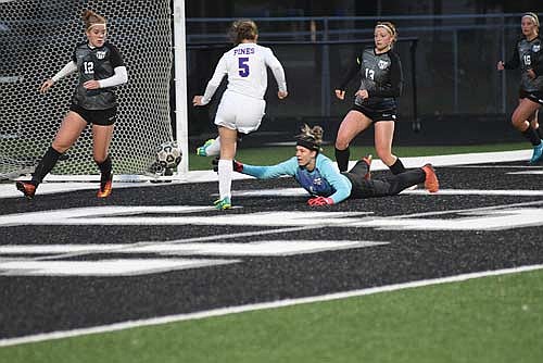 Rosa Hornig (12) defends the net with Northland Pines’ Ryley Darr taking a shot as a diving Ave Evenhouse, Landry Lenz (13) and Molly Jorgensen (16) watch in the second half Tuesday, May 20 at IncredibleBank Field in Minocqua. Hornig stopped the shot to preserve the shutout. (Photo by Brett LaBore/Lakeland Times)