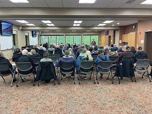 Nearly 60 people, most of them residents of the town of Pelican, attended a public meeting regarding a proposed water well for the city of Rhinelander on Tuesday, May 20. The well, if ultimately approved, would be on Nicolet College property which is in the town of Pelican. (Photo by Brian Jopek/Lakeland Times)