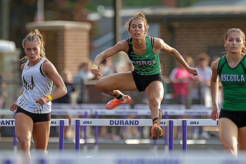 Rhinelander’s Aila Bergman races Hayward’s Brianna Hexum, left, and Osceola’s Elletta Uddin, right, to the finish in the 300-meter hurdles during a WIAA Division 2 track and field sectional in Durand Friday, May 30. Bergman finished third in the event, breaking a school record in the process, as she qualified for the WIAA state meet. (Jeremy Mayo/River News)