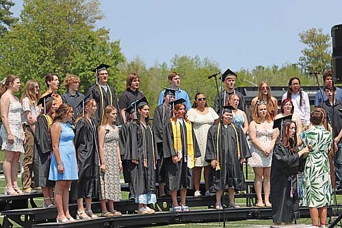 The Lakeland Union High School Choir performs during the ceremony. (Photo by Kate Reichl/Lakeland Times)