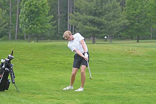 Davis Kock hits a shot on the fifth hole during a WIAA Division 2 sectional meet Wednesday, June 4 at Hayward Golf Course. Kock shot a career-low 70 on his way to event medalist for a second straight meet. (Photo by Brett LaBore/Lakeland Times)