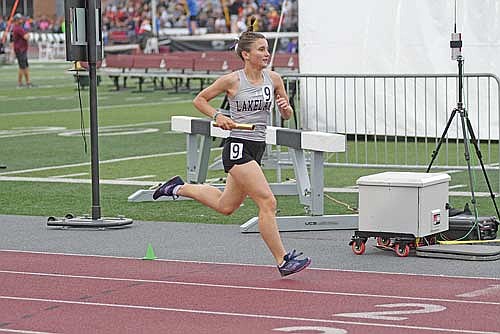 Ada Ernst runs the second leg of Lakeland’s 4x800-meter relay during the WIAA Division 2 state meet Friday, June 6 at Veterans Memorial Field Sports Complex at the University of Wisconsin-La Crosse. (Photo by Brett LaBore/Lakeland Times)