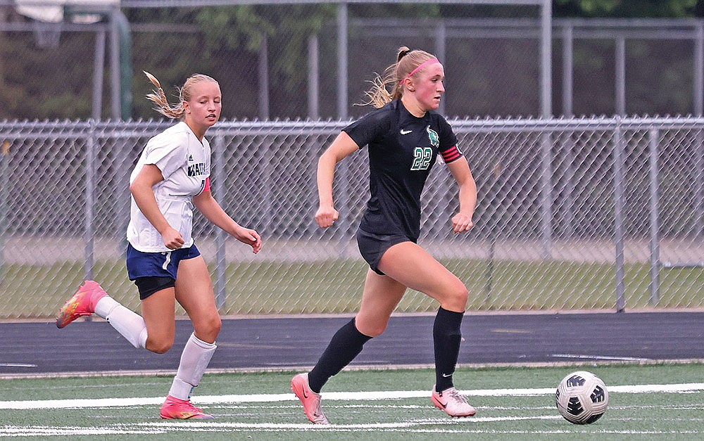 Rhinelander’s Vivian Lamers possesses the ball during a WIAA Division 3 girls’ soccer playoff game against Waupaca at Mike Webster Stadium Saturday, June 7. Lamers earned unanimous first-team All-Great Northern Conference honors and was named the GNC’s co-offensive player of the year. (Bob Mainhardt for the River News)
