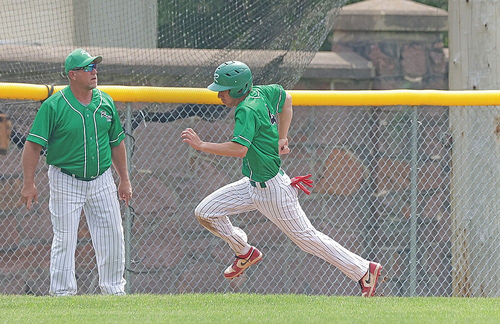 Rhinelander’s Quinn Lamers rounds third and scores on a two-run single by Easton Senoraske during the second game of a Dairyland League baseball doubleheader at Merrill Sunday, June 8. Rhinelander salvaged a split of the doubleheader, beating Merrill 7-1 in the second game after dropping the first, 5-2. (Jeremy Mayo/River News)