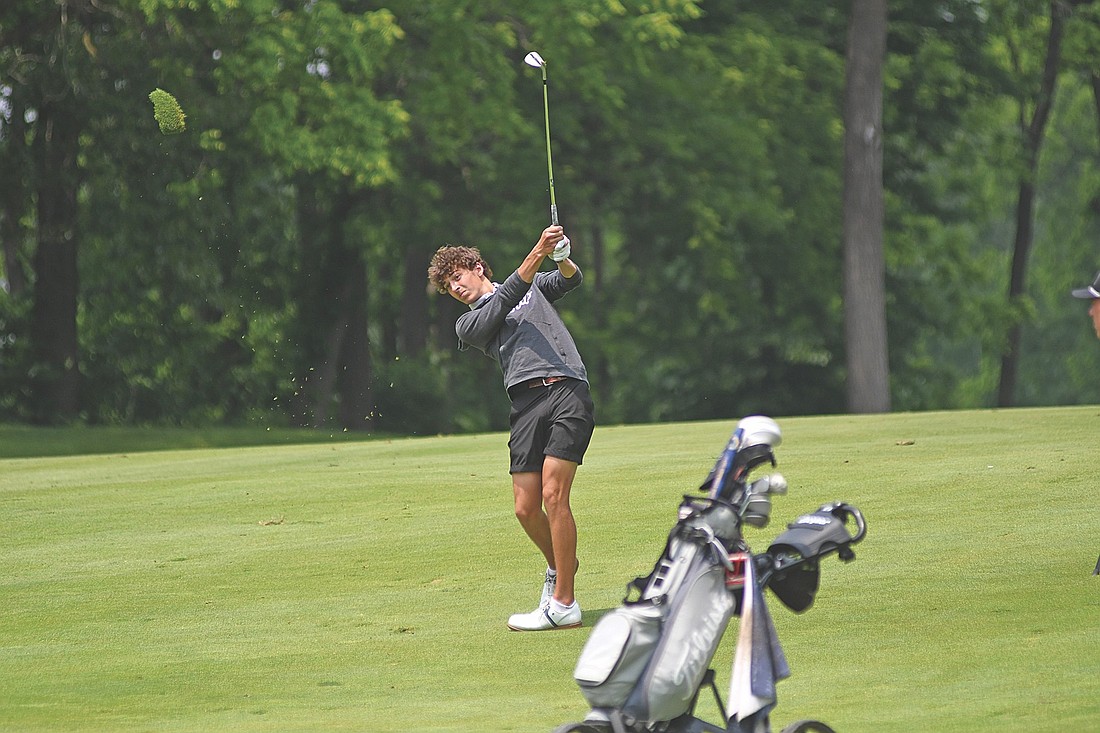 Jeremy Hensen hits a shot at the 14th hole during the WIAA Division 2 state meet Tuesday, June 10 at University Ridge Golf Course in Madison. Hensen tied for 17th with a 161. (Photo by Brett LaBore/Lakeland Times)