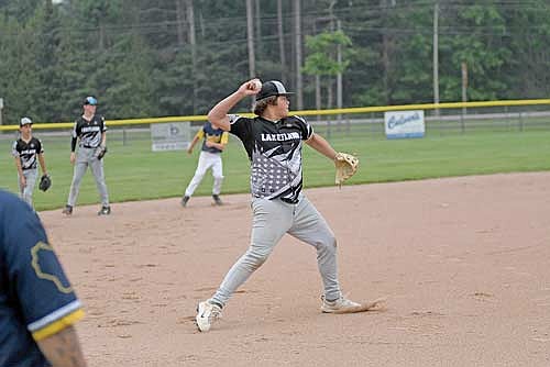 Will Schuman makes the throw to first to record the out in the second inning of an 18-2 win over Tomahawk Wednesday, June 11 at the Minocqua Park Complex. (Photo by Brett LaBore/Lakeland Times)
