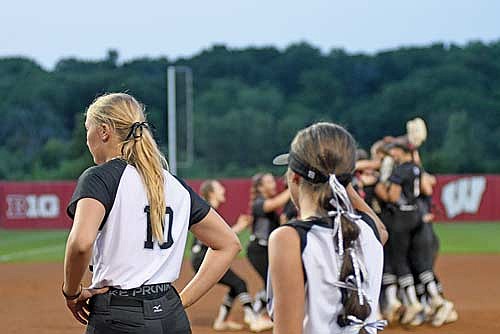 Saylor Timmerman (10) and Lani Frisch line up as Denmark celebrates a 3-2 win in a WIAA Division 2 state semifinal game Friday, June 13 at Irwin A. & Robert D. Goodman Softball Complex in Madison. (Photo by Brett LaBore/Lakeland Times)