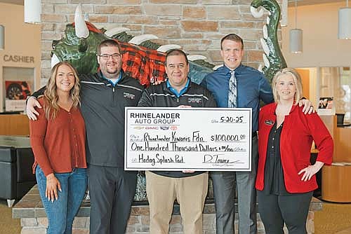 Those attending the check presentation are, from left: Miranda Gavrilescu, marketing coordinator; Tim Nordby, general sales manager; Dan Towne, owner; Brandon Karaba, Kiwanis; Tarsie Goes, marketing coordinator. (Contributed photograph)