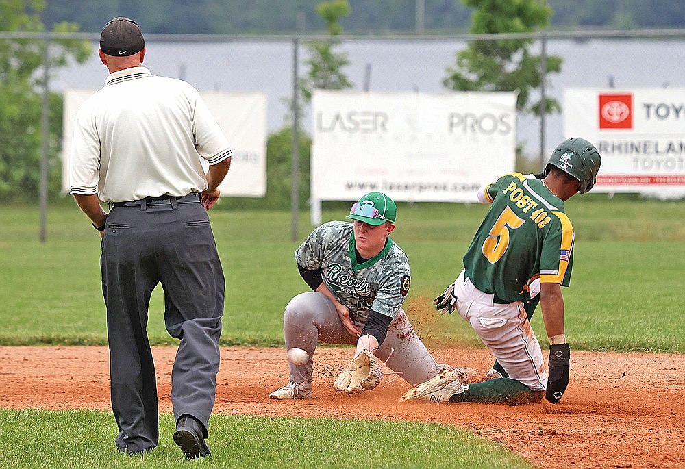 Rhinelander’s Tyler Chariton fields a throw to second on a stolen base attempt by Everest’s JJ Lewis during the second inning of an American Legion baseball game against Everest at Stafford Field Sunday, June 15. (Bob Mainhardt for the River News)
