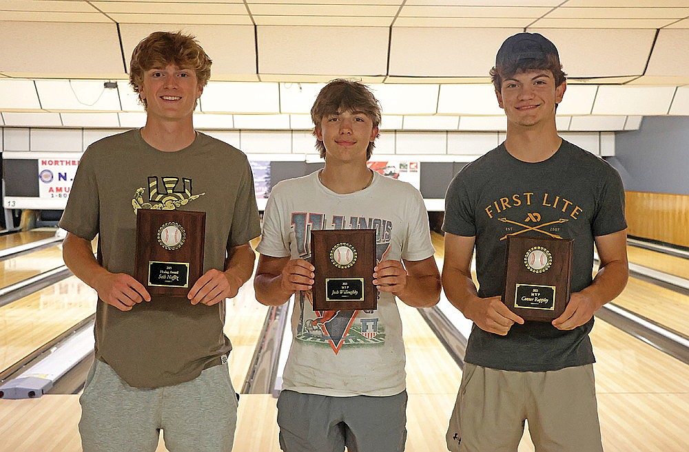 Rhinelander High School baseball team varsity award winners, from left to right, Seth Nofftz, Josh Willoughby and Conner Rappley, pose for a photograph following the team’s banquet at Nick’s Hodag Lanes Monday, June 16. (Jeremy Mayo/River News)